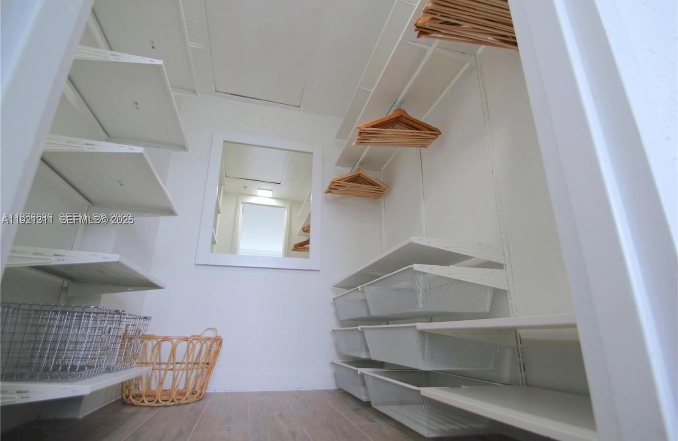 1500 Bay Road, Unit 374S Miami Beach, FL 33139 - Photo 16 of 33 a view of staircase and kitchen view