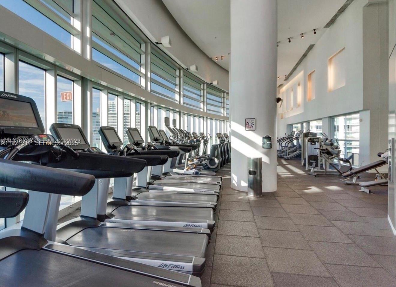 1500 Bay Road, Unit 374S Miami Beach, FL 33139 - Photo 22 of 33 a view of a room with gym equipment