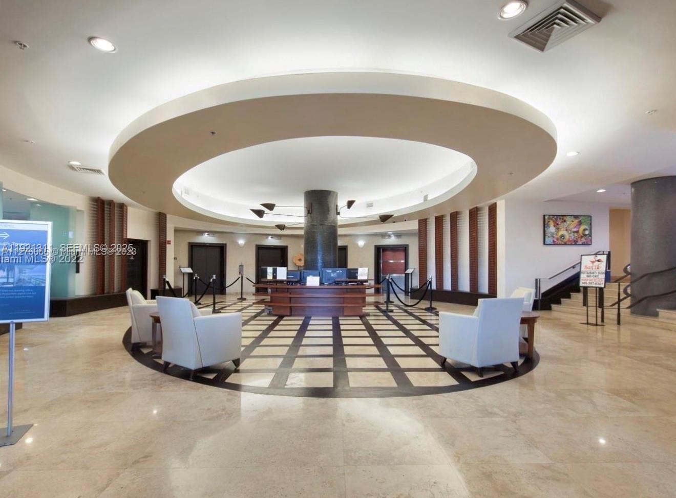 1500 Bay Road, Unit 374S Miami Beach, FL 33139 - Photo 23 of 33 a living room with furniture and view of pool