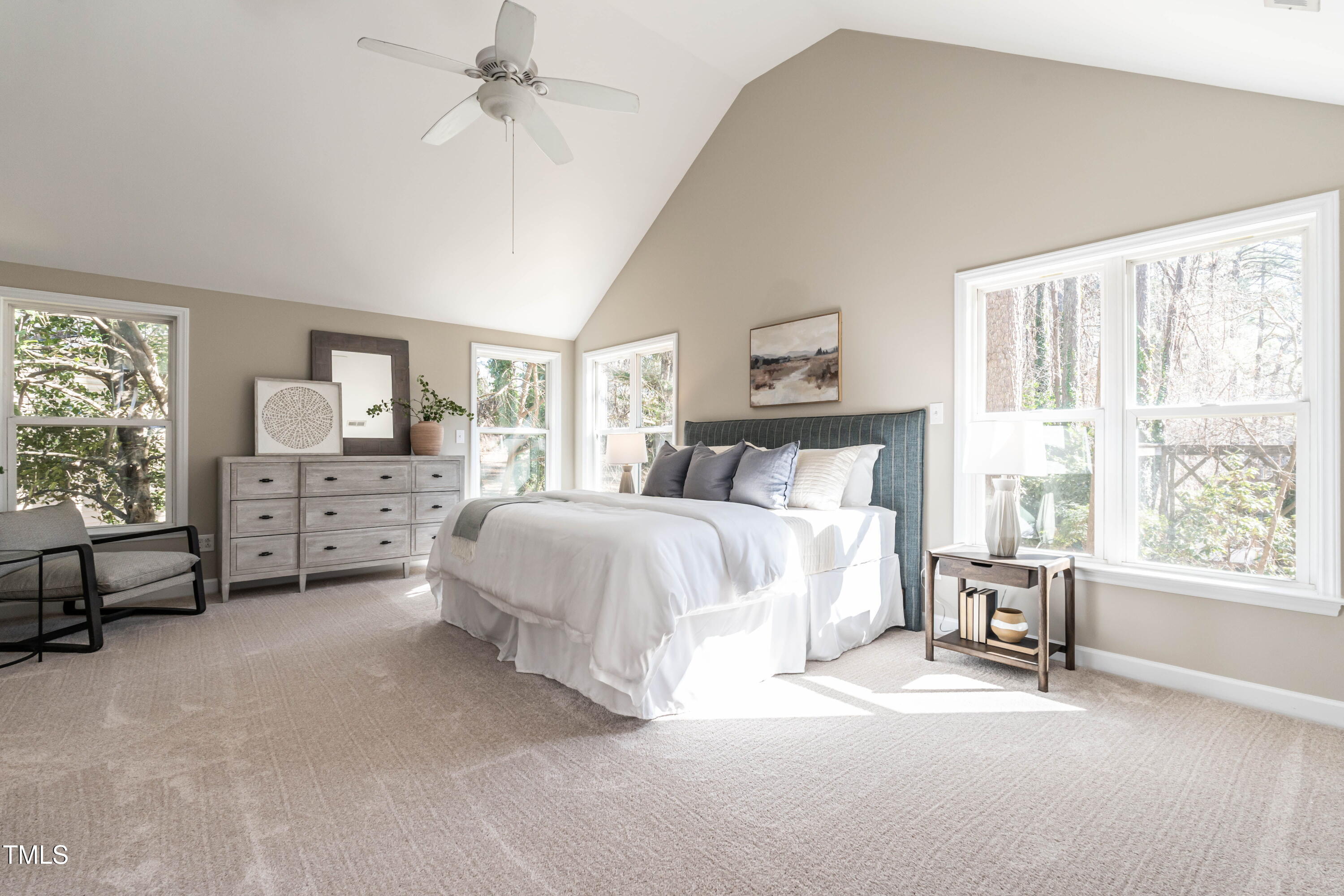 1001 Whetstone Court Raleigh, NC 27615 - Photo 14 of 31 a bedroom with a large bed and a window