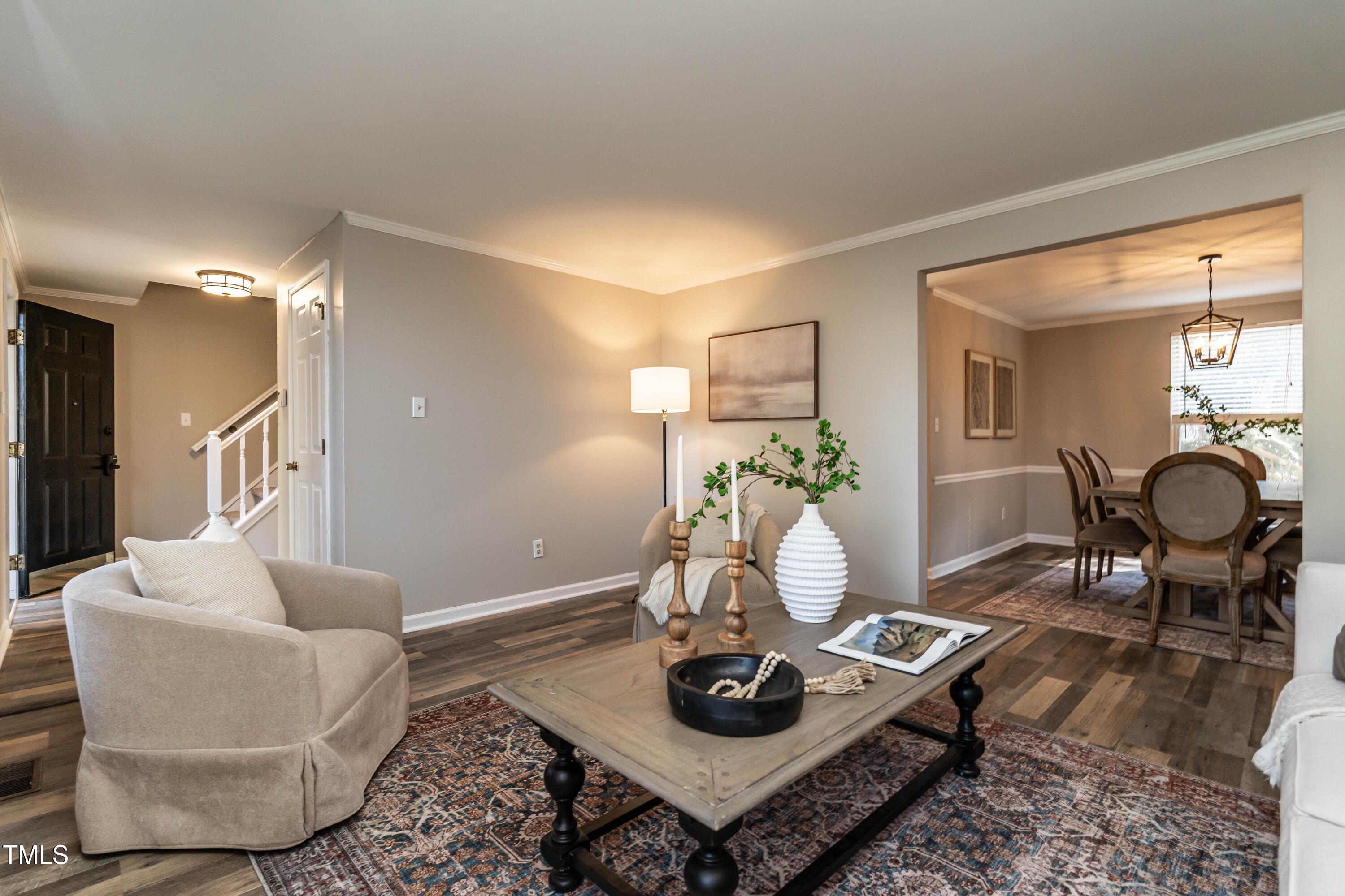 1001 Whetstone Court Raleigh, NC 27615 - Photo 5 of 31 a living room with furniture and wooden floor