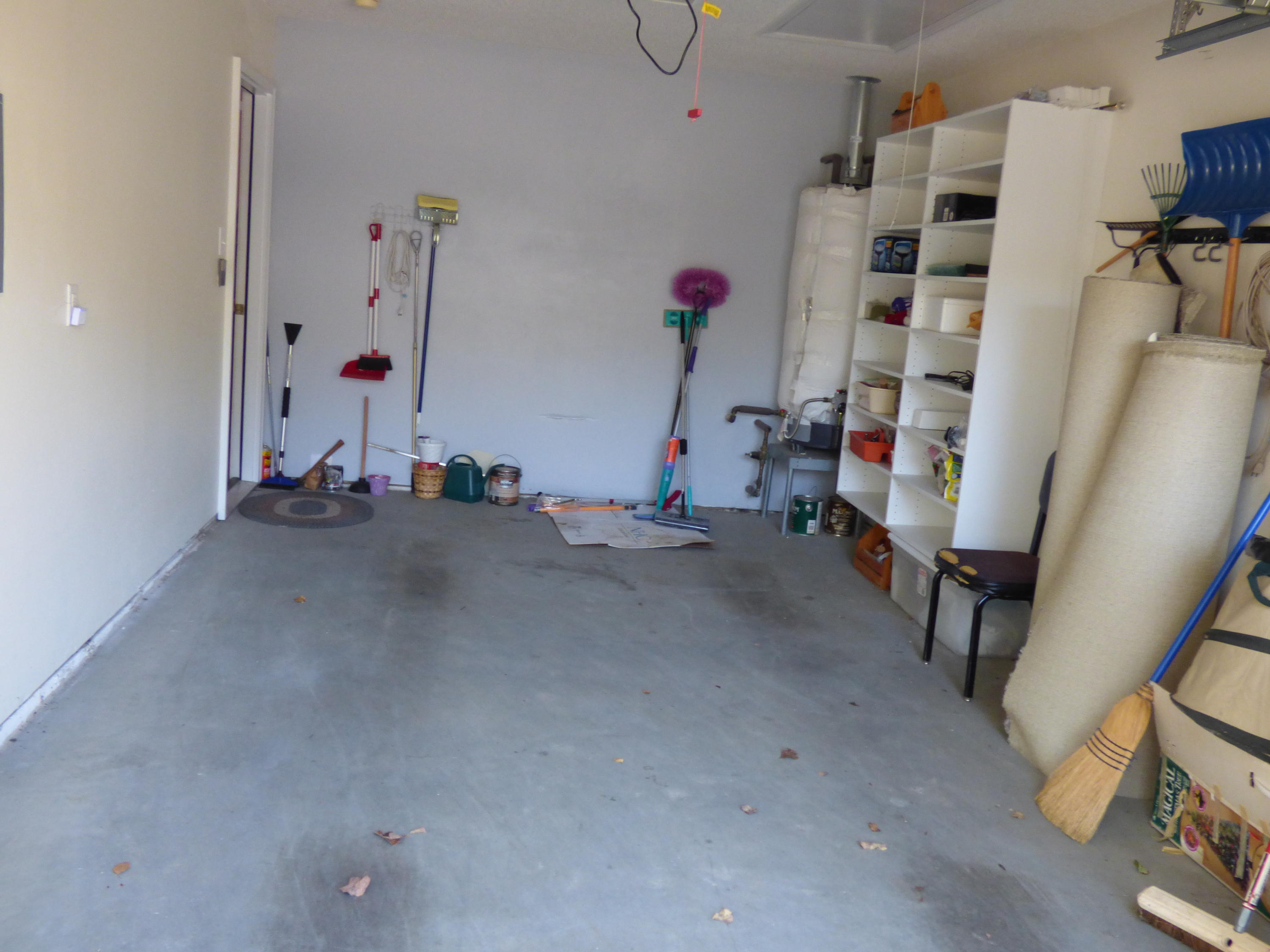 8060 Stablegate Way Powell, TN 37849 - Photo 17 of 18 shelving in garage