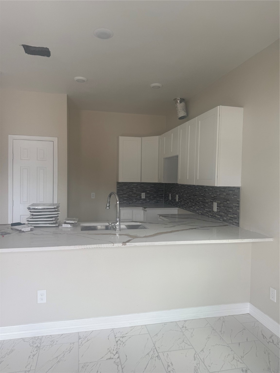 8215 La Porte Road Houston, TX 77012 - Photo 12 of 15 a view of kitchen with cabinets and appliances