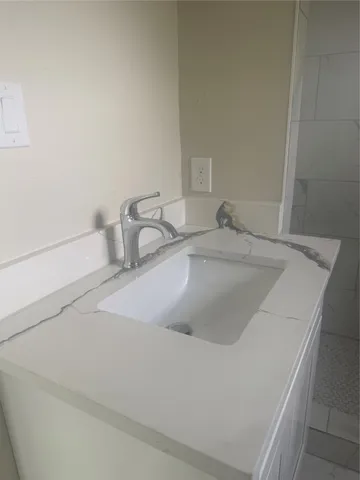 a close view of sink and tap