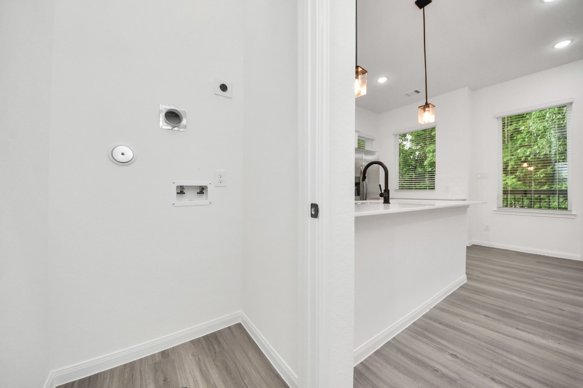5103 Mallow Street, Unit B Houston, TX 77033 - Photo 14 of 30 a view of a kitchen from the hallway