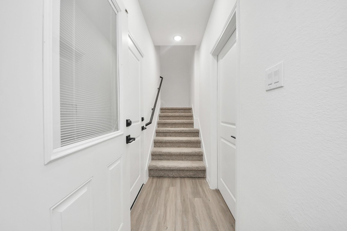 5103 Mallow Street, Unit B Houston, TX 77033 - Photo 21 of 30 a view of entryway with wooden floor
