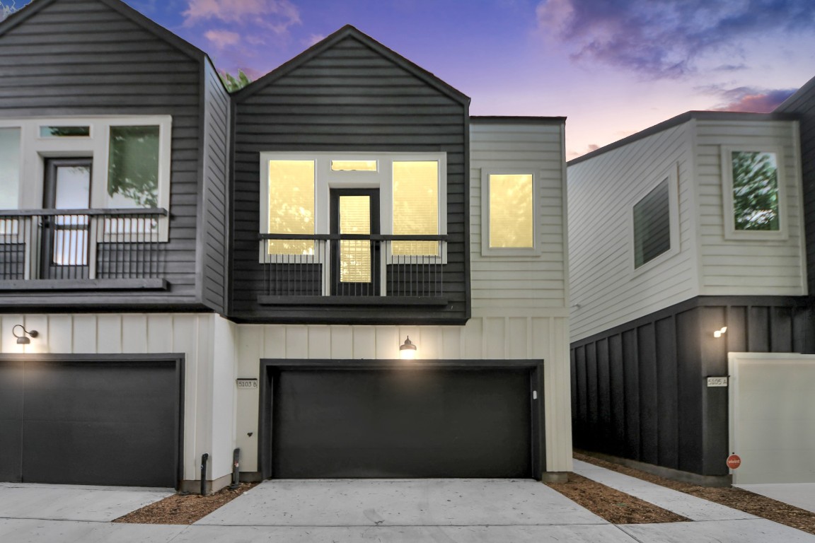 5103 Mallow Street, Unit B Houston, TX 77033 - Photo 27 of 30 a front view of a house with large windows