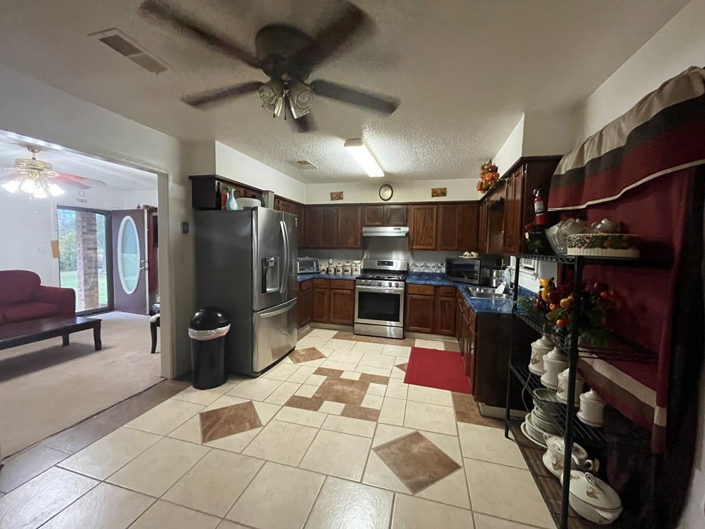 561 Stump Town Road Silver Creek, MS 39663 - Photo 5 of 21 Kitchen looking into Living Room