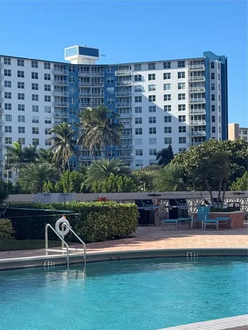 a view of building with outdoor space and seating space