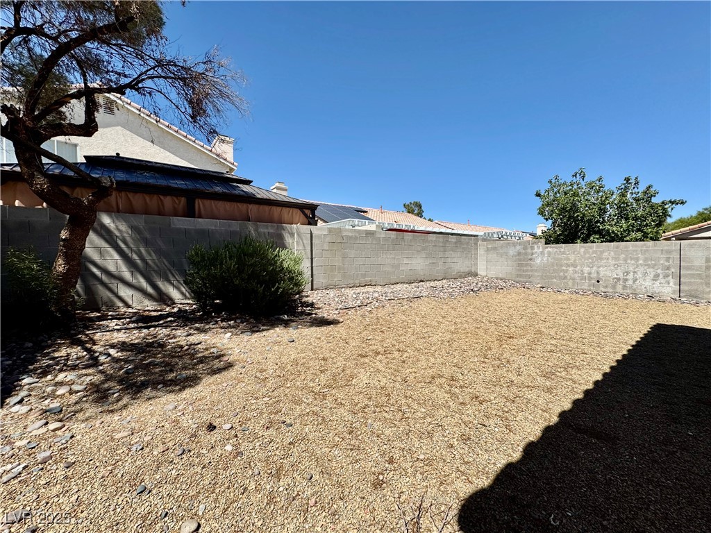 1828 Badger Canyon Avenue North Las Vegas, NV 89031 - Photo 14 of 14 View of fenced backyard