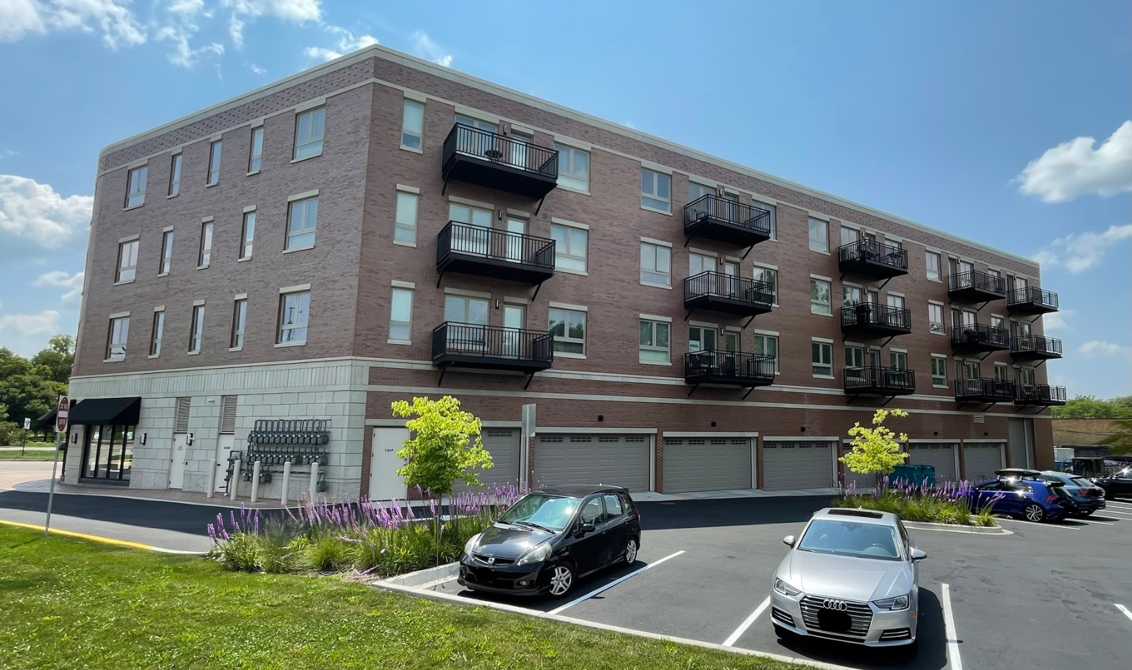 555 Roger Williams Avenue, Unit 405 Highland Park, IL 60035 - Photo 12 of 12 a car parked in front of a building