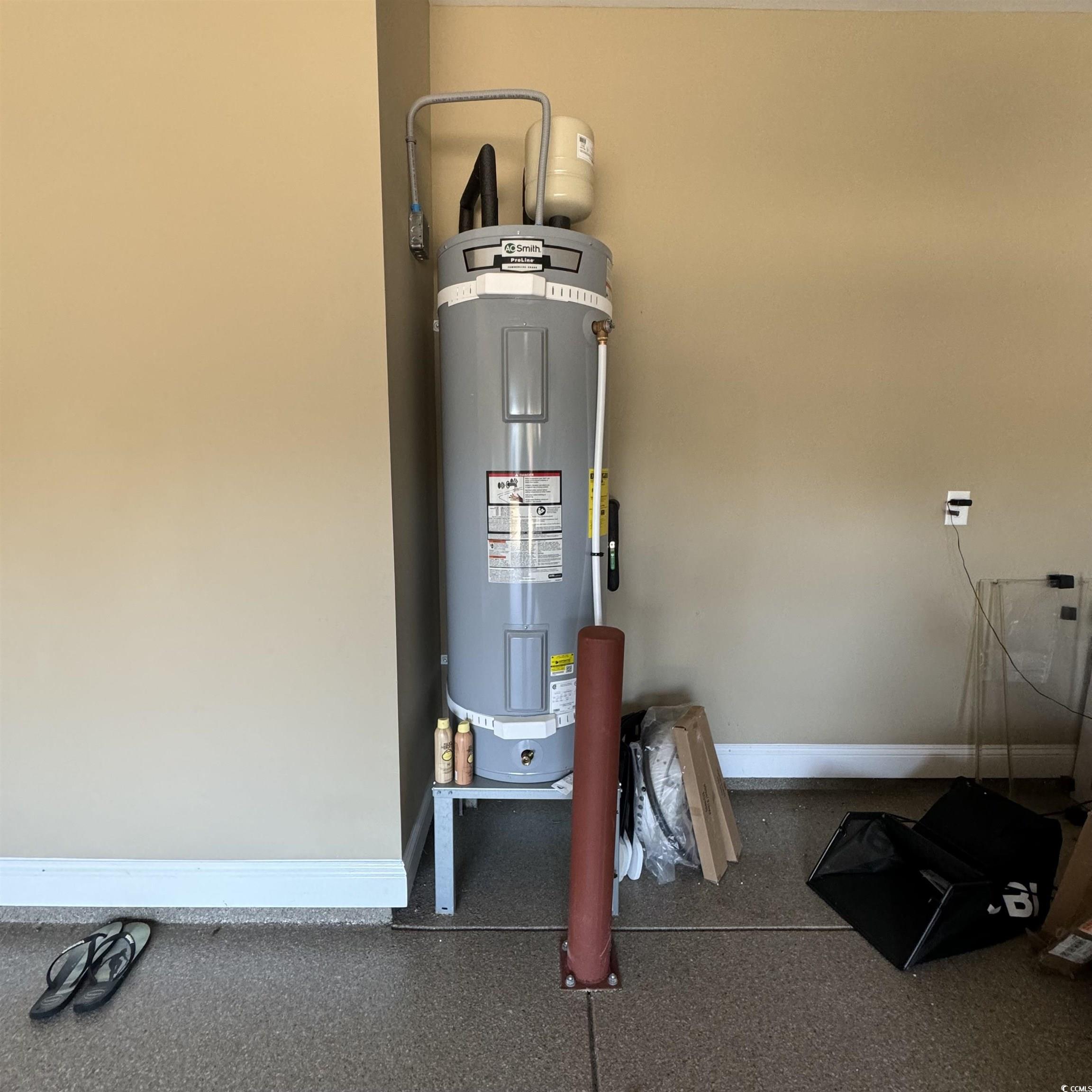 633 11th Avenue South Myrtle Beach, SC 29577 - Photo 22 of 25 Utility room with strapped water heater