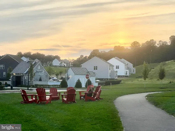 a view of a house with a big yard