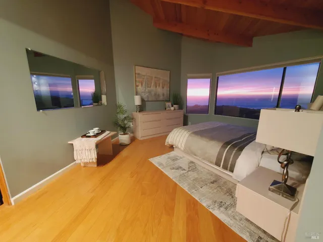 a spacious bathroom with a bathtub sink and mirror