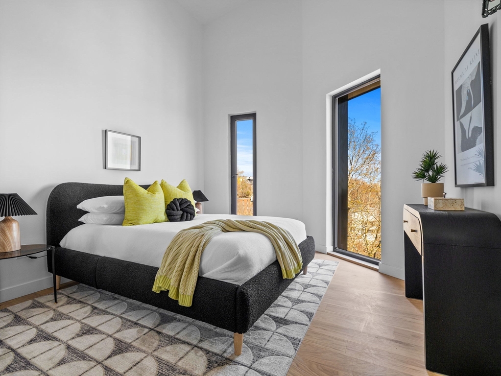 a bed room with a bed and a couch