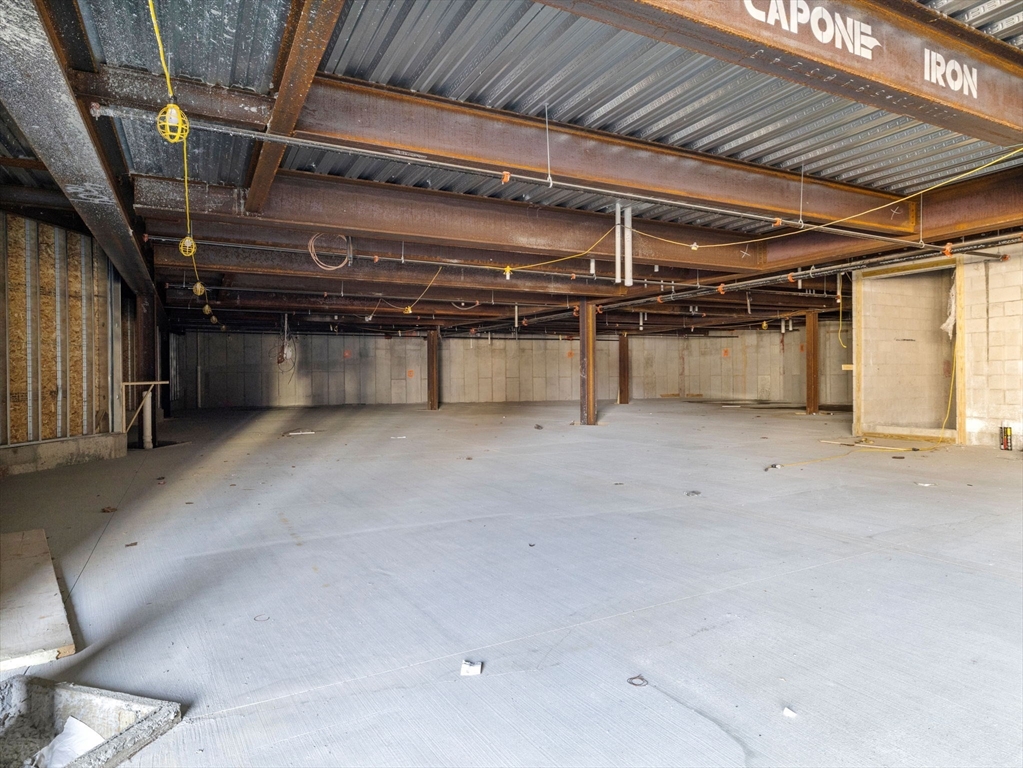 22 High Street, Unit 101 Boston, MA 02122 - Photo 9 of 10 a view of a room with wooden walls