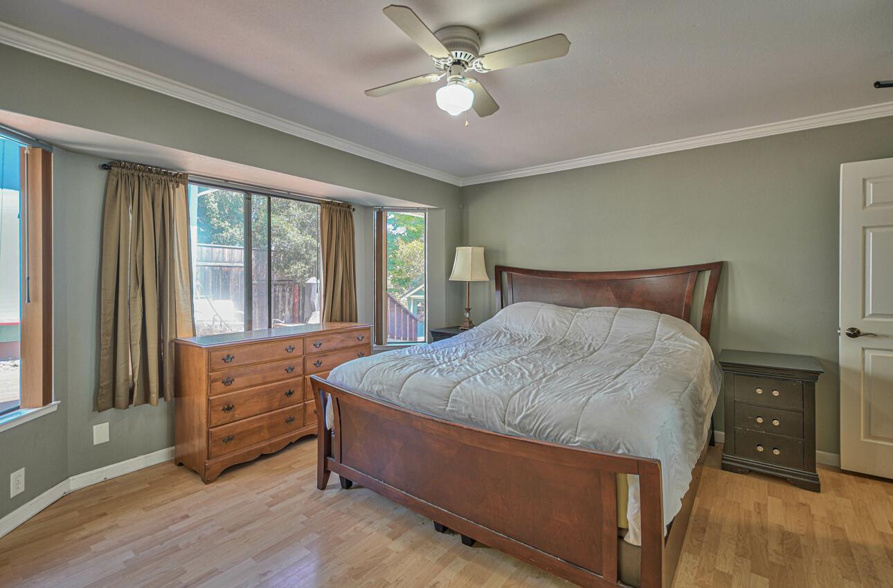 19205 Marjorie Road Salinas, CA 93907 - Photo 13 of 30 a bedroom with a bed dresser and a window