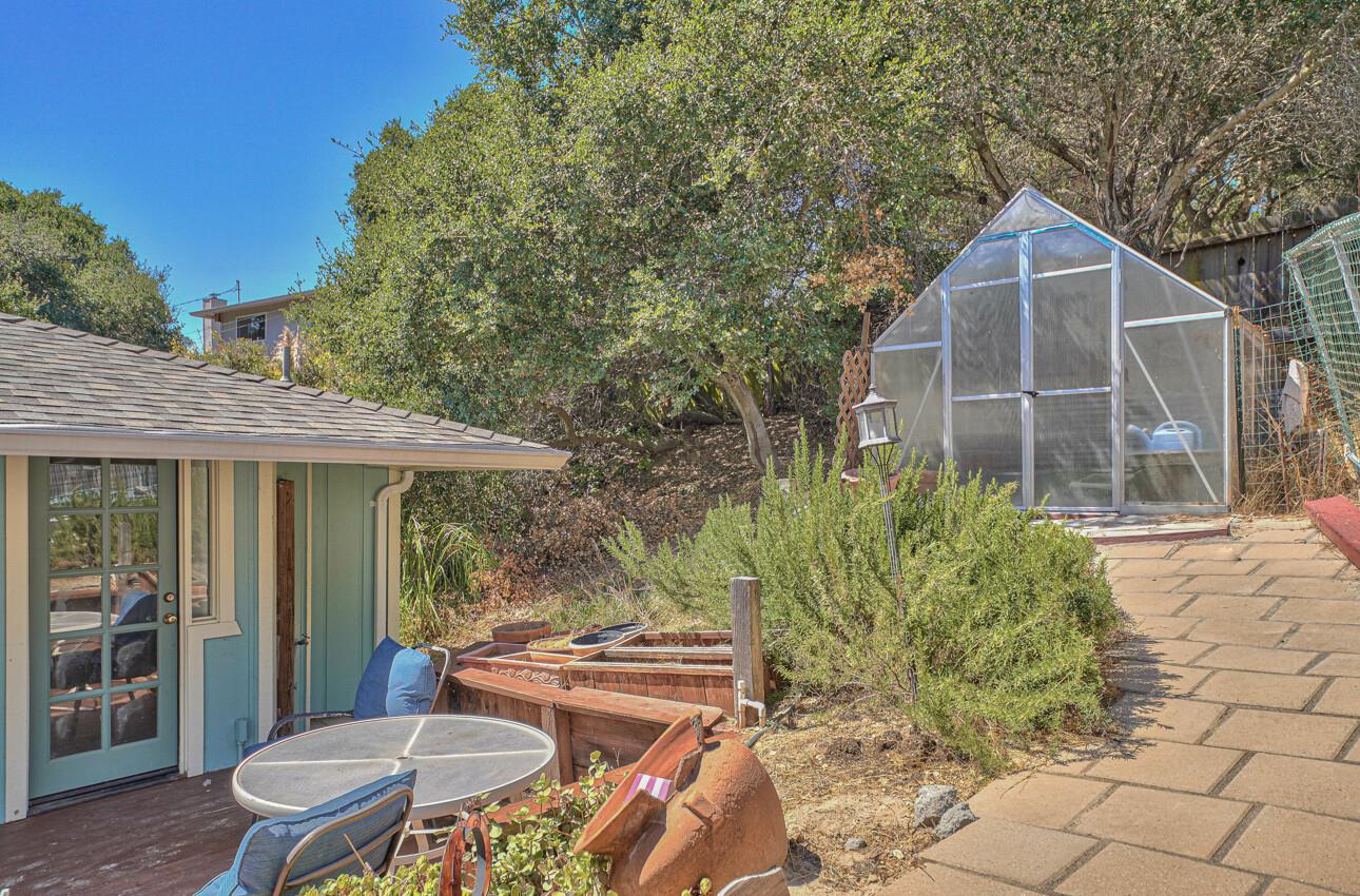 19205 Marjorie Road Salinas, CA 93907 - Photo 26 of 30 a view of a backyard with table and chairs and potted plants