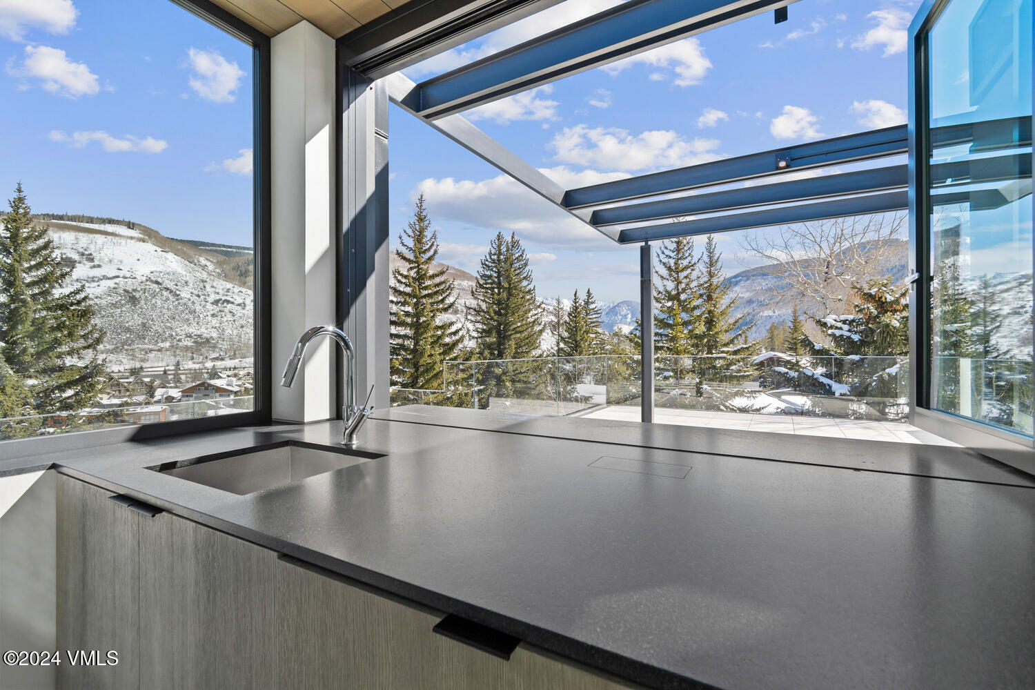 165 West Forest Road Vail, CO 81657 - Photo 11 of 56 Outdoor kitchenet with mountain views