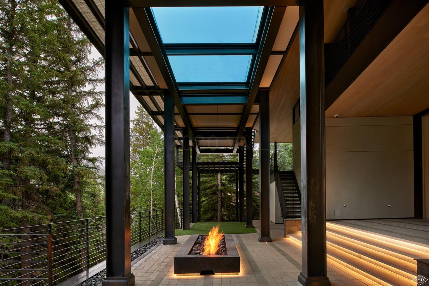 165 West Forest Road Vail, CO 81657 - Photo 30 of 56 Fire pit under the pool