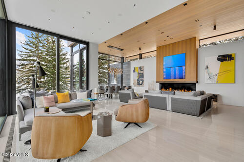 165 West Forest Road Vail, CO 81657 - Photo 52 of 56 Windows floor to ceiling in living room