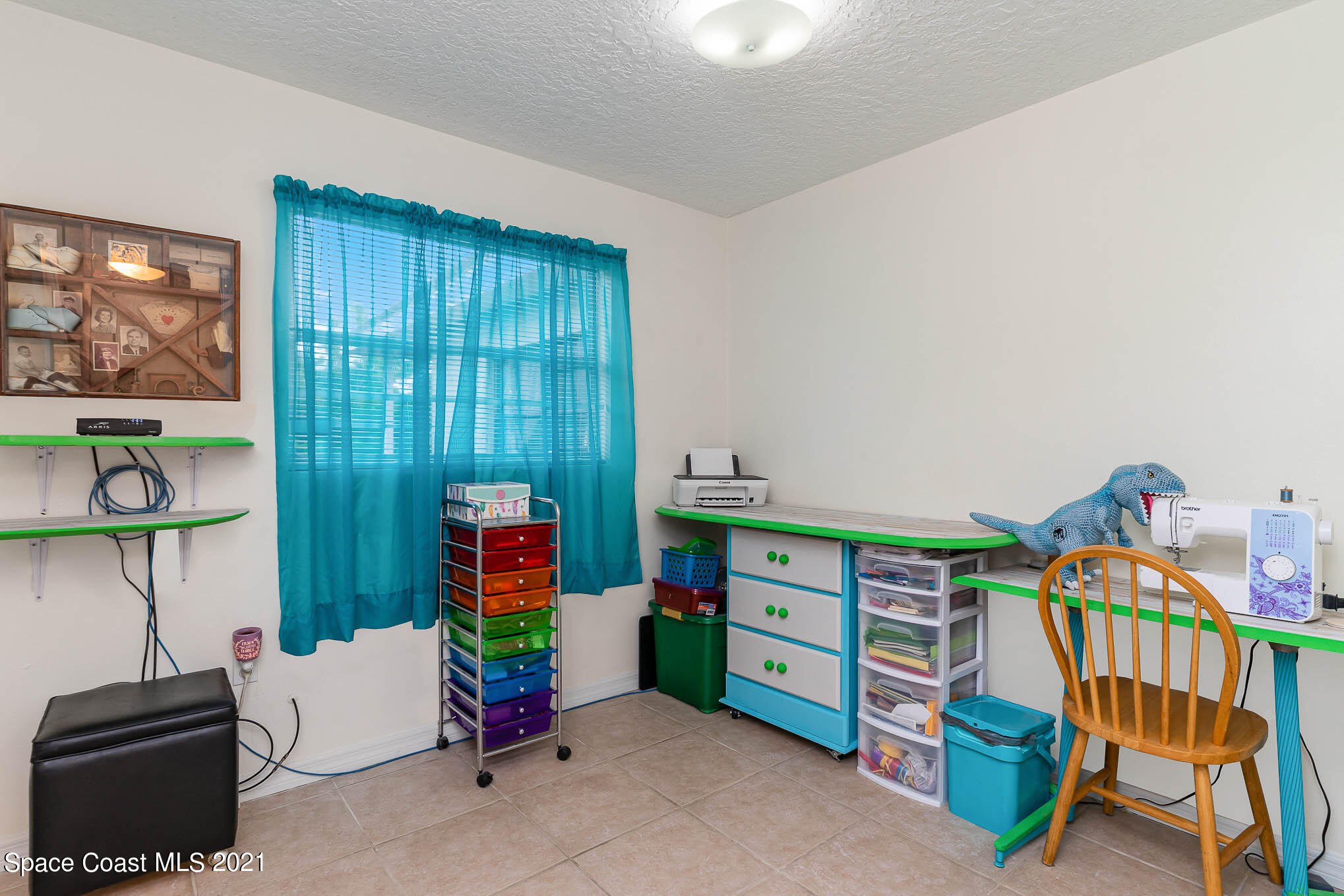 2285 Dolphin Road Titusville, FL 32780 - Photo 18 of 27 a children room with toys
