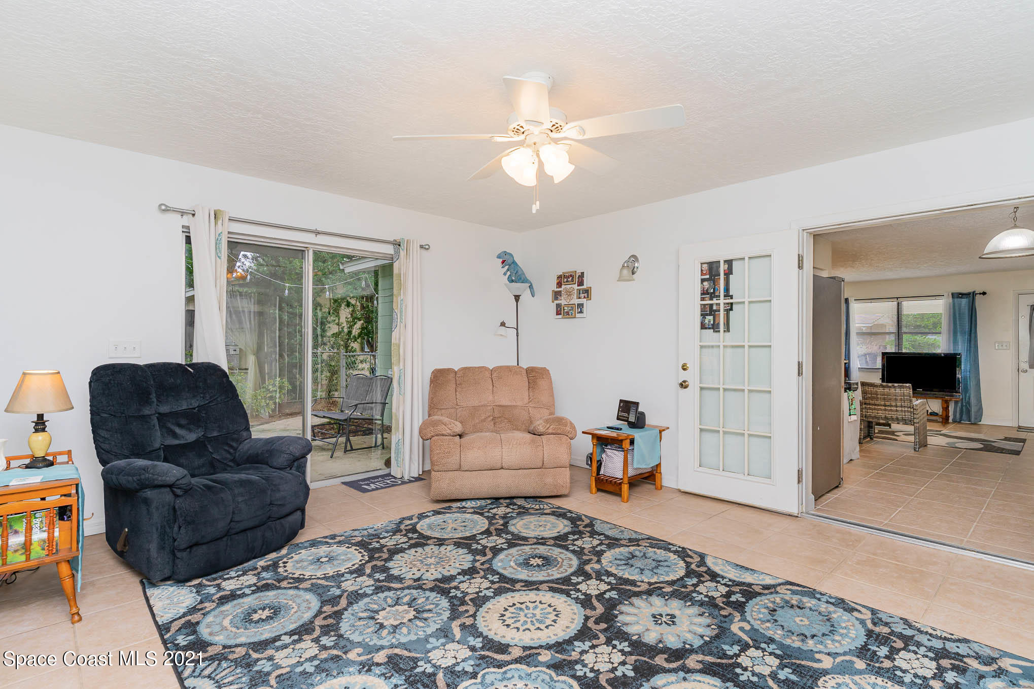2285 Dolphin Road Titusville, FL 32780 - Photo 27 of 27 a living room with furniture and a window