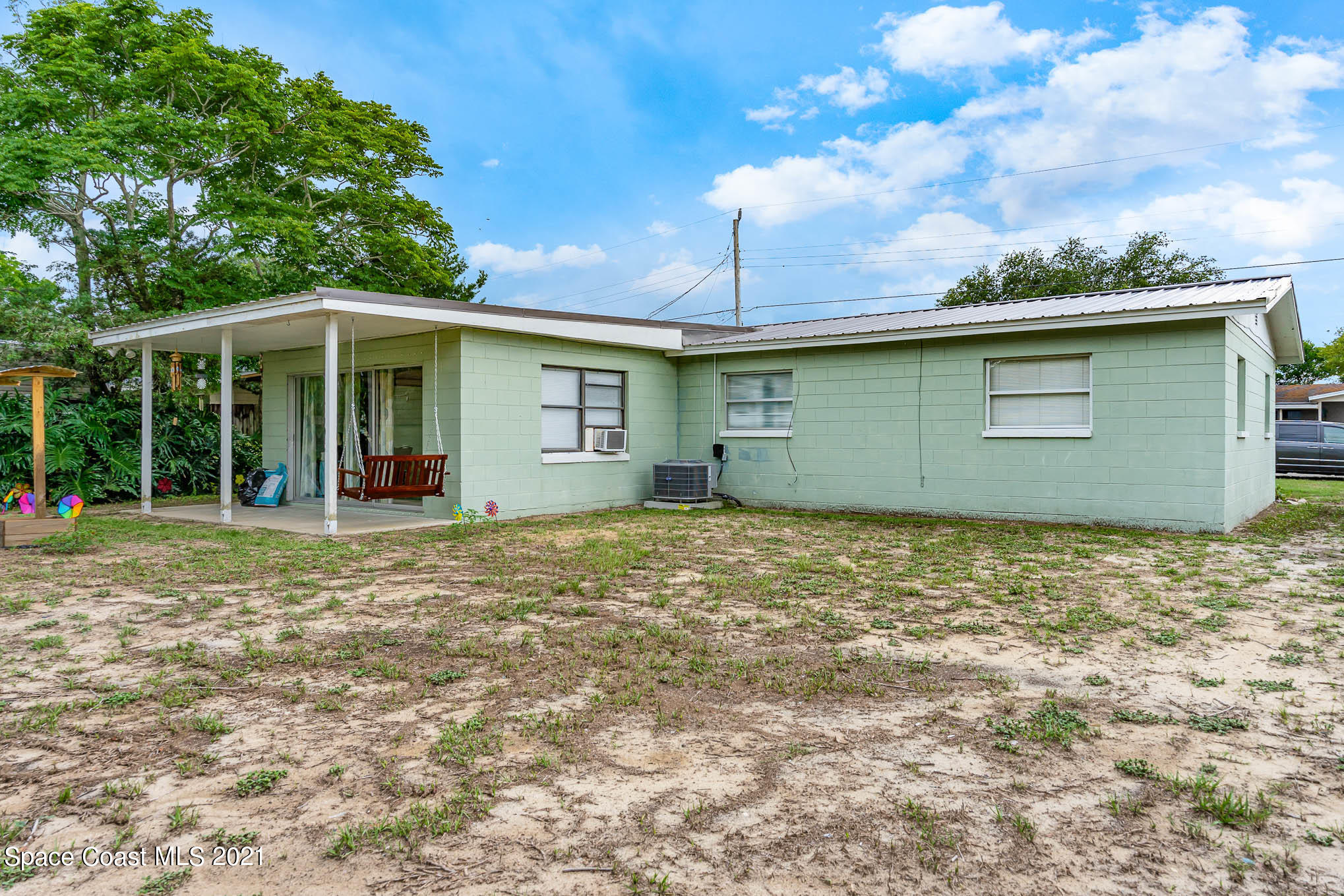 2285 Dolphin Road Titusville, FL 32780 - Photo 5 of 27 a view of a house with backyard