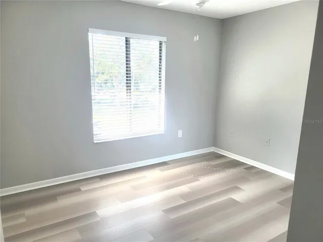 a view of a room with a window