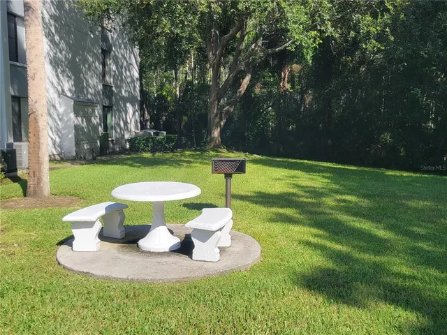 a view of a golf course with a fountain