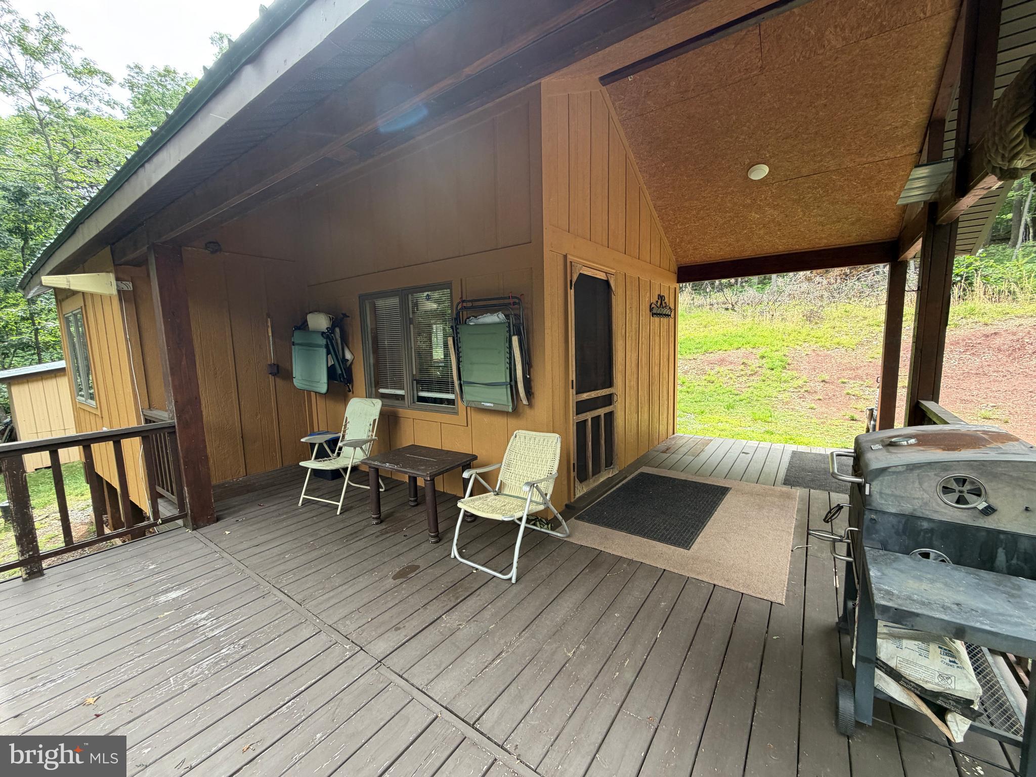 1419 Paul's Woods Road Delray, WV 26714 - Photo 76 of 105 a living room with furniture and large windows