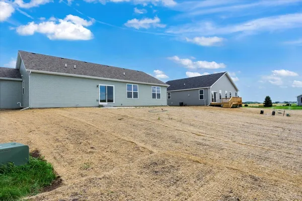 a view of large house with a yard