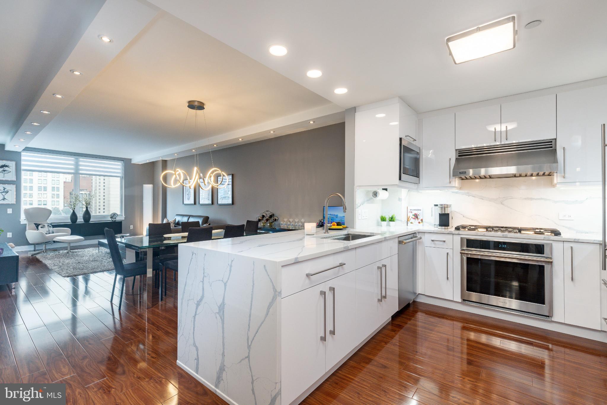 400 South Broad Street, Unit 1503 Philadelphia, PA 19146 - Photo 1 of 29 Sleek modern kitchen with elegant finishes.