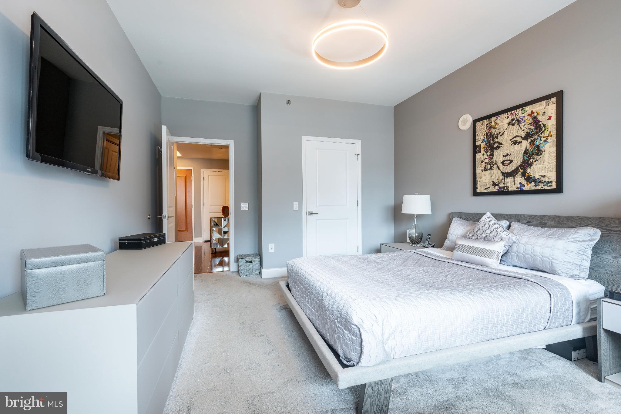 400 South Broad Street, Unit 1503 Philadelphia, PA 19146 - Photo 13 of 29 Modern bedroom with stylish decor accents.