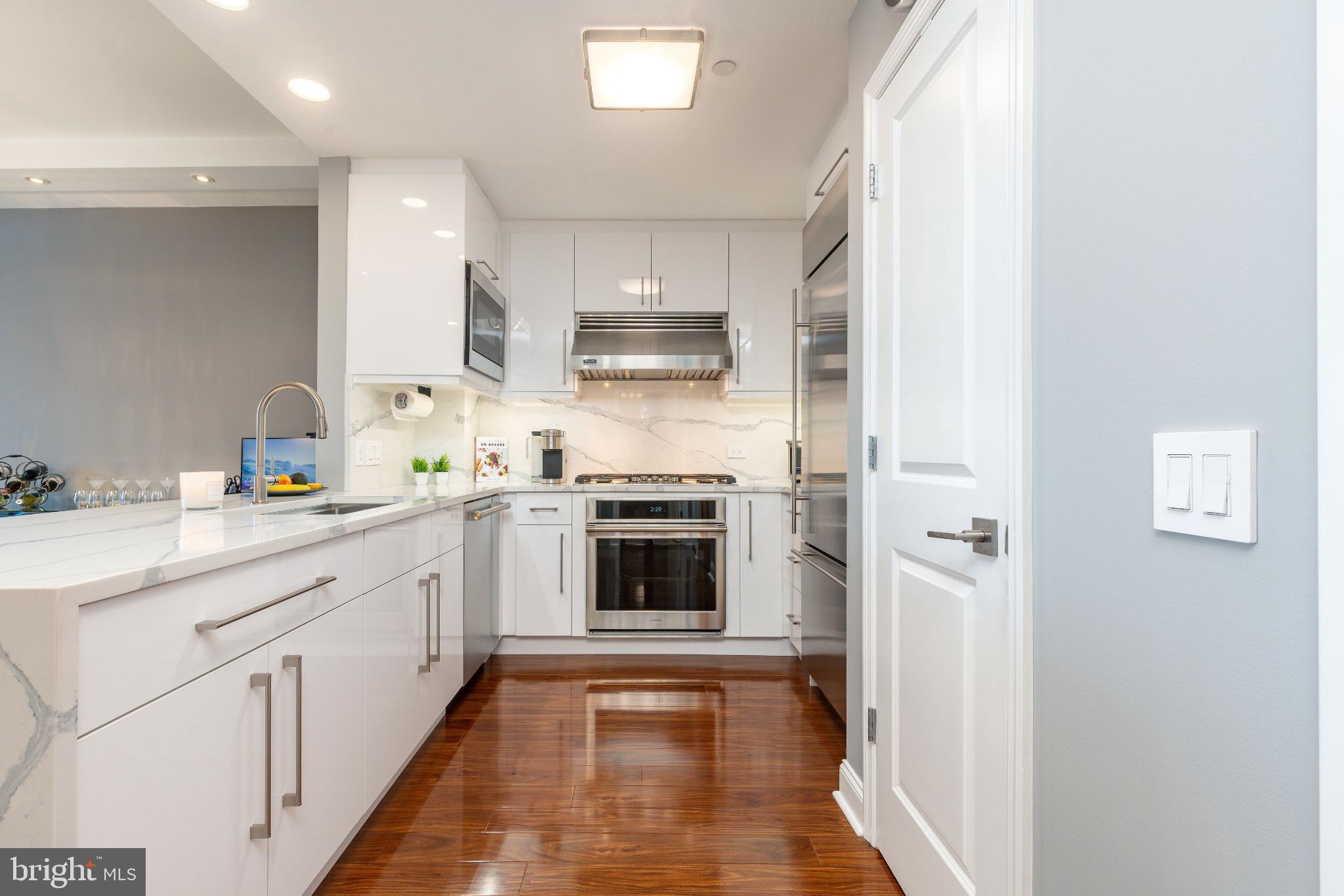 400 South Broad Street, Unit 1503 Philadelphia, PA 19146 - Photo 2 of 29 Sleek modern kitchen with elegant finishes.