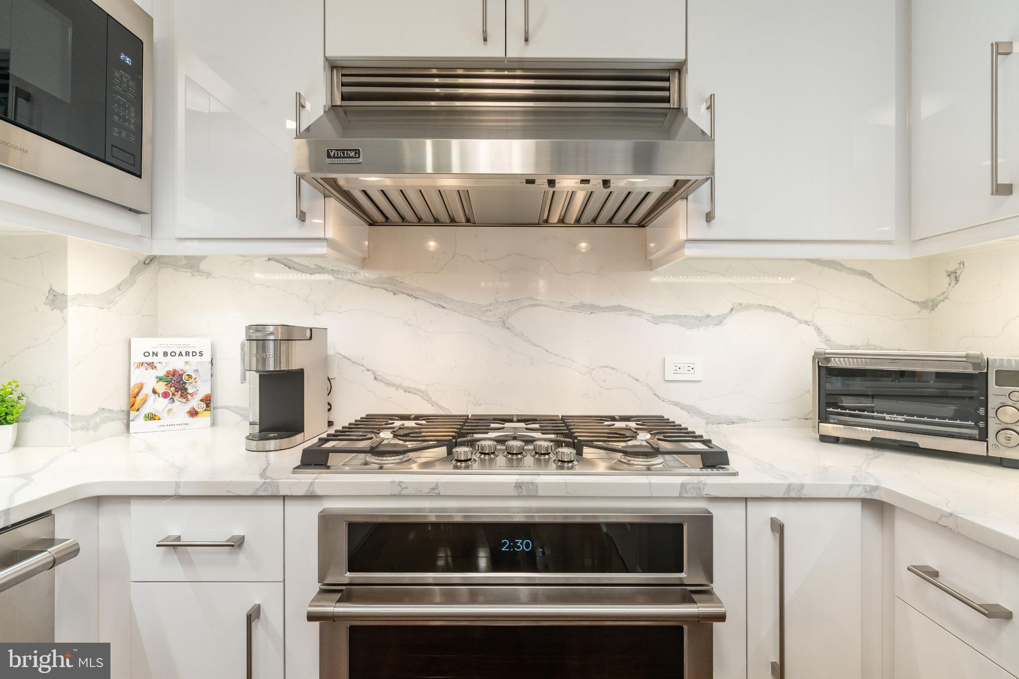 400 South Broad Street, Unit 1503 Philadelphia, PA 19146 - Photo 3 of 29 Sleek modern kitchen with elegant finishes.