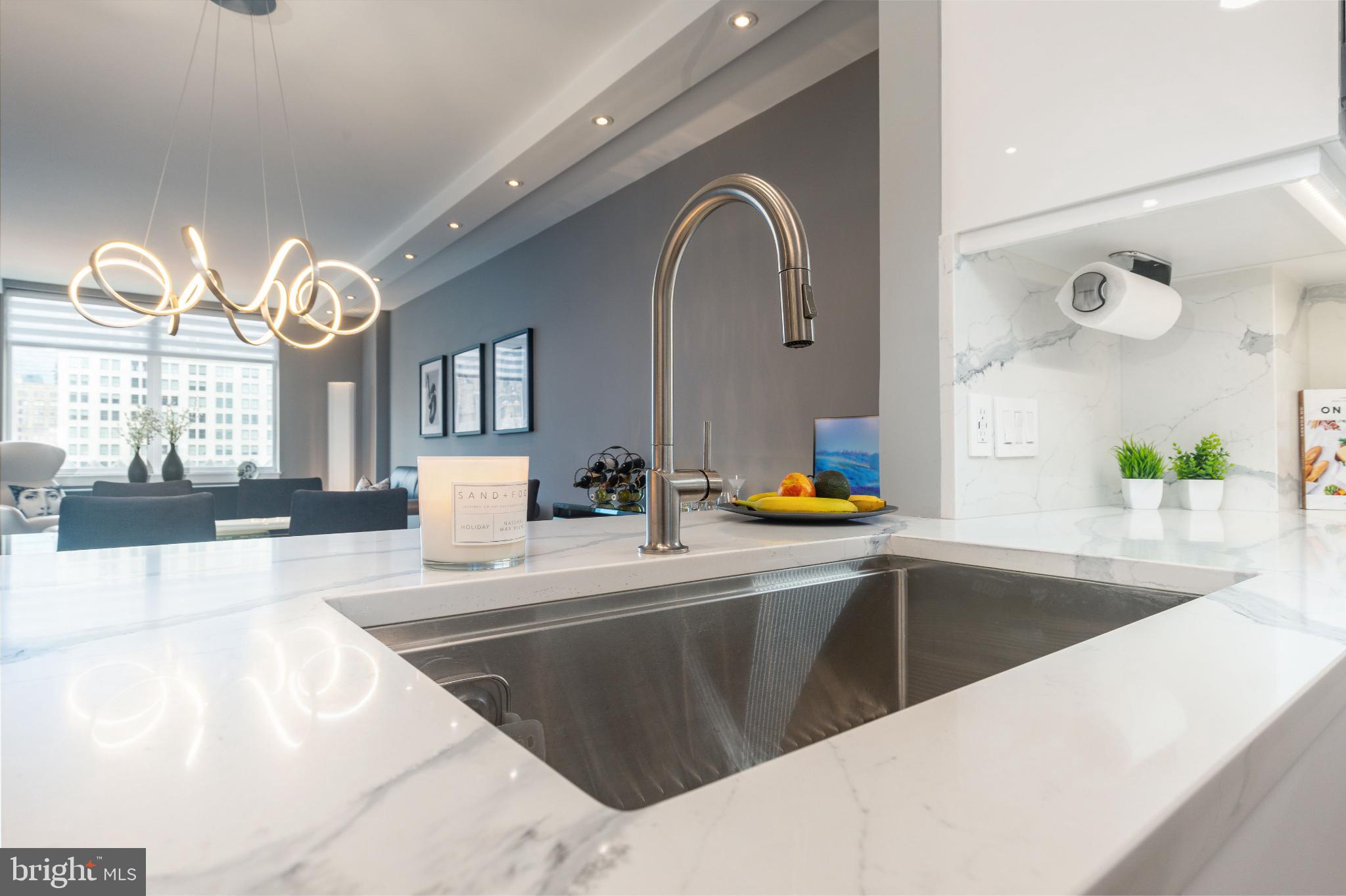 400 South Broad Street, Unit 1503 Philadelphia, PA 19146 - Photo 4 of 29 Sleek kitchen with modern elegance.