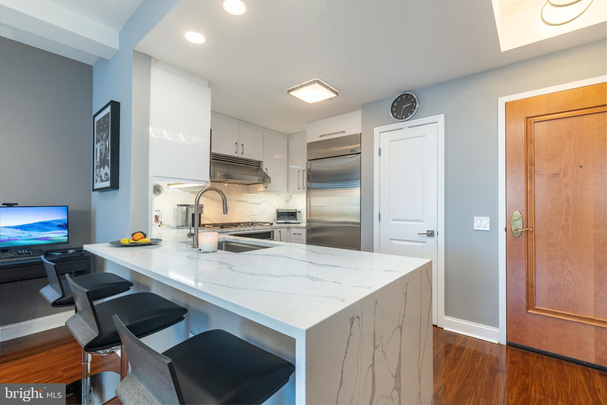 400 South Broad Street, Unit 1503 Philadelphia, PA 19146 - Photo 5 of 29 Sleek kitchen with modern finishes and style.