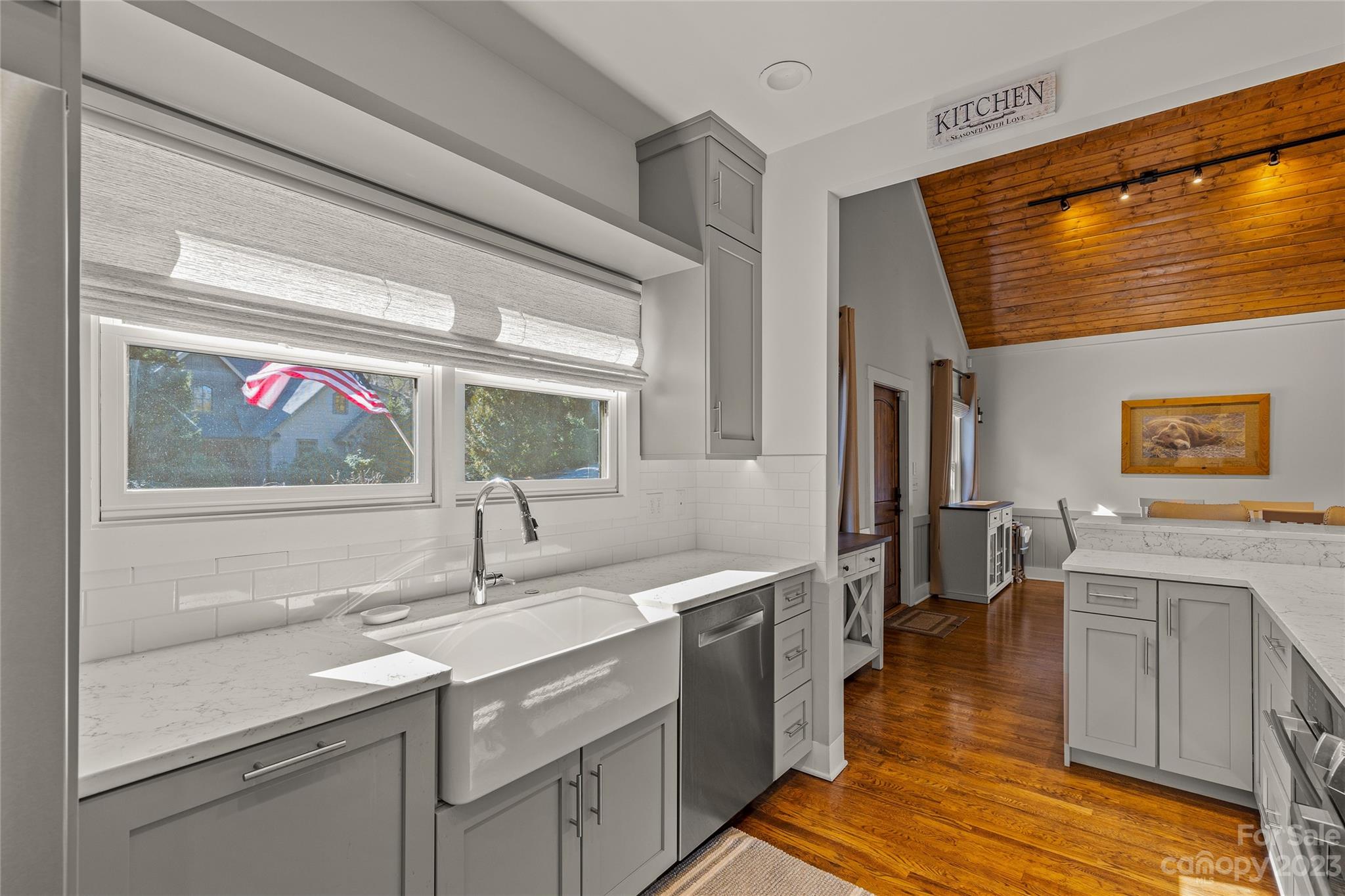 160 Deer Run Road Sapphire, NC 28774 - Photo 8 of 42 a kitchen with a sink and a stove top oven