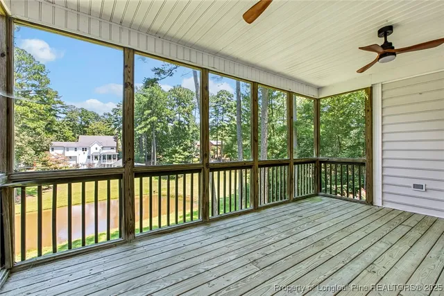 a view of a balcony with wooden floor