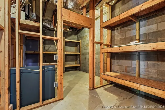 a view of a brick house with an outdoor space