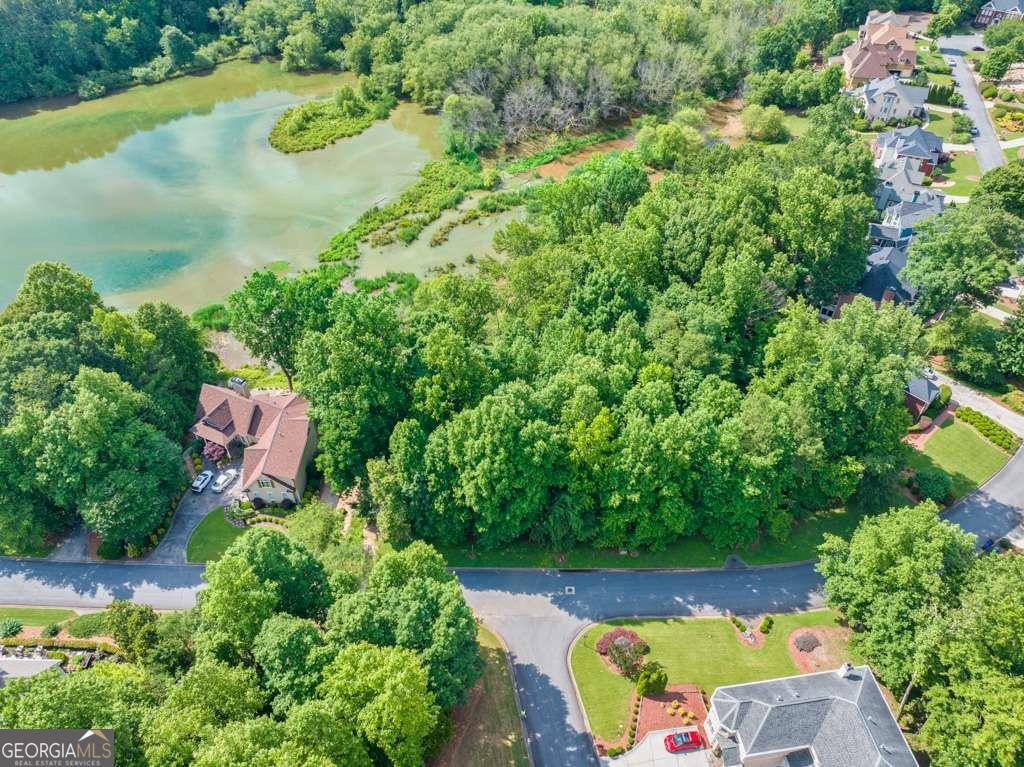 2276-2286 Lake Ridge Terrace Lawrenceville, GA 30043 - Photo 12 of 13 an aerial view of a house with a yard