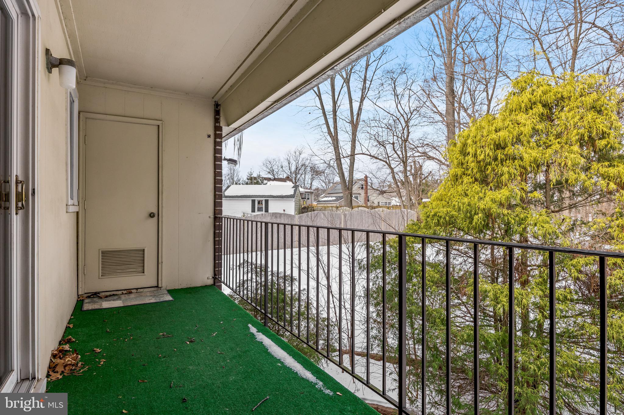 411 Stiles Avenue, Unit A2 Maple Shade, NJ 08052 - Photo 17 of 26 a view of a porch with a yard