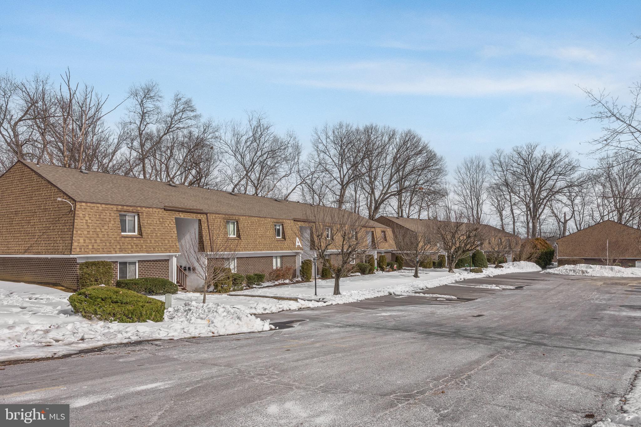 411 Stiles Avenue, Unit A2 Maple Shade, NJ 08052 - Photo 23 of 26 a view of a house with a yard
