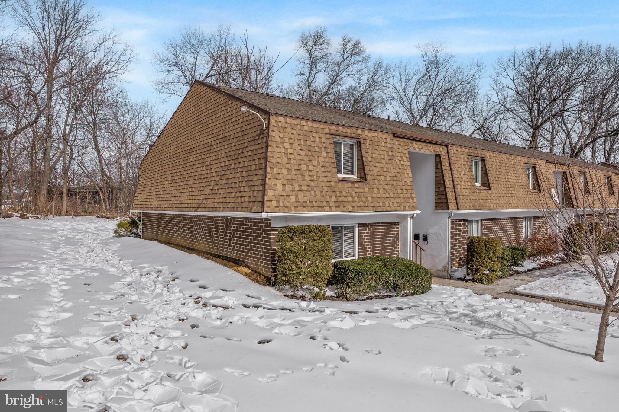 411 Stiles Avenue, Unit A2 Maple Shade, NJ 08052 - Photo 24 of 26 a view of a house with a yard