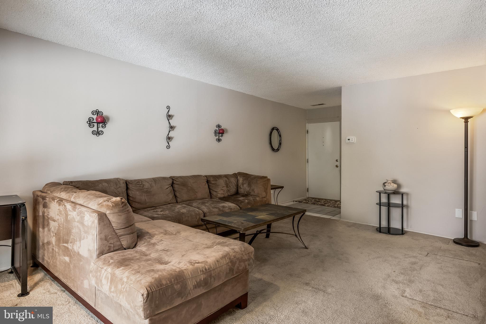 411 Stiles Avenue, Unit A2 Maple Shade, NJ 08052 - Photo 5 of 26 a living room with furniture