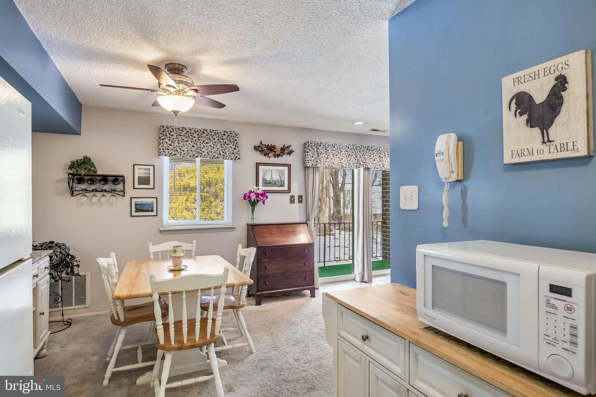 411 Stiles Avenue, Unit A2 Maple Shade, NJ 08052 - Photo 7 of 26 a kitchen that has a table and chairs in it