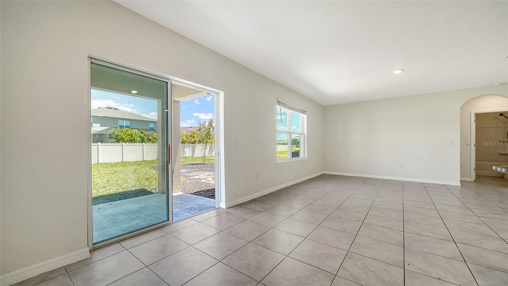 12732 Lateral Root Drive Sarasota, FL 34238 - Photo 11 of 76 an empty room with windows