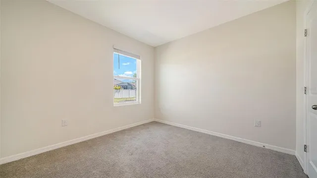 an empty room with an entryway