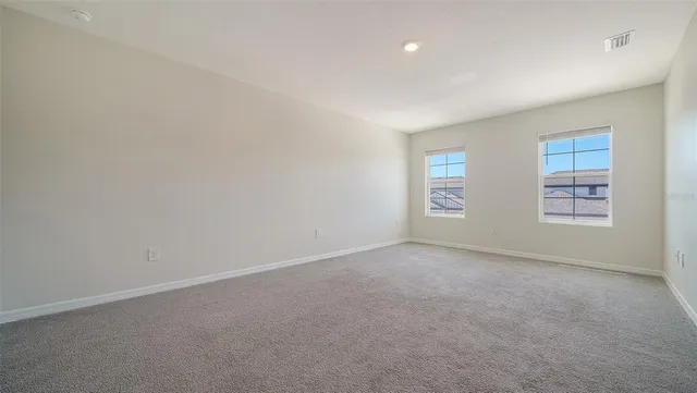 an empty room with windows